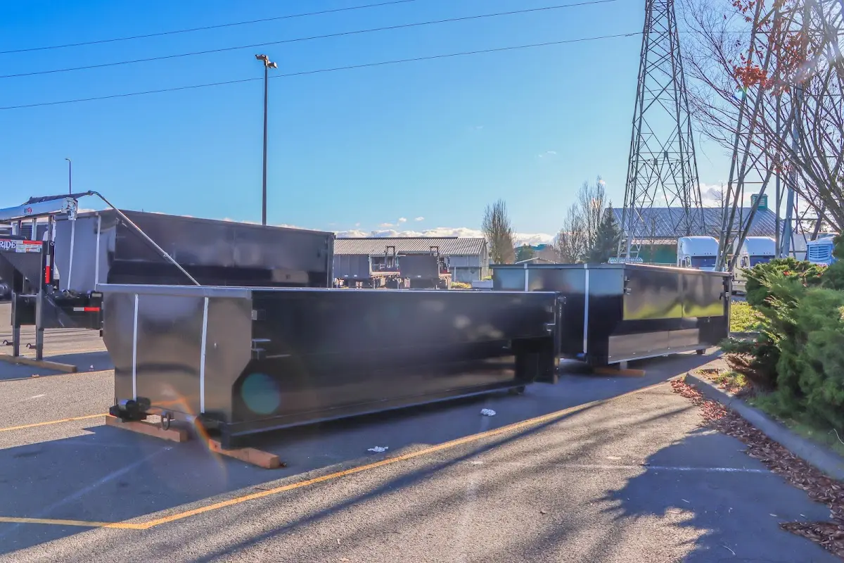 Roll-off dumpster ready for waste disposal at job site for 2 Yard Dumpster Rental in Kalkaska